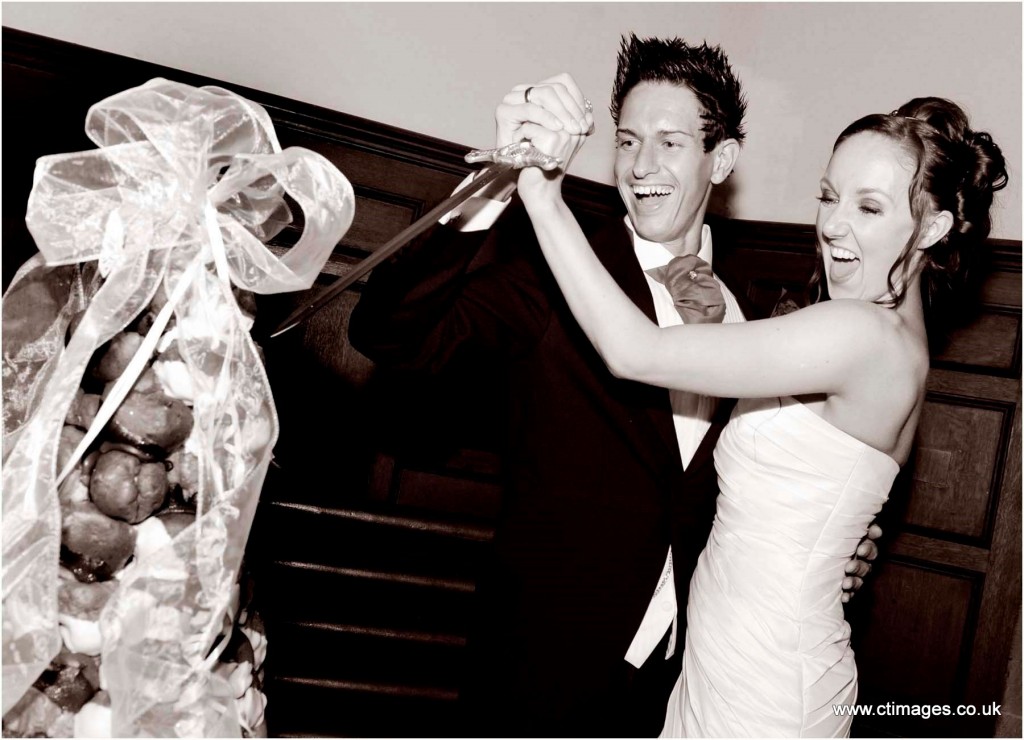 peckforton-castle-wedding-photography-cutting-the-cake peckforton-castle-wedding-photography-cutting-the-cake