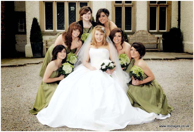 see mitton hall wedding photography lloyd and rhiannons wedding here mitton-hall-wedding-photography-bridesmaids-pose-with-bride.jpg