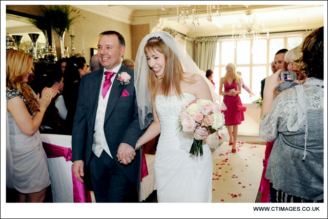 see mitton hall wedding photography emma and daves wedding here mitton-hall-weddings-couple-walk-down-aisle.jpg