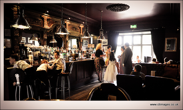 mitton hall clitheroe weddings 18 mitton-hall-wedding-photography-guests-in-bar