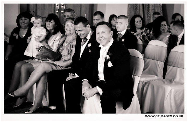 DSC_7525 holiday-inn-bolton-weddings-photography-groom-waiting-bride