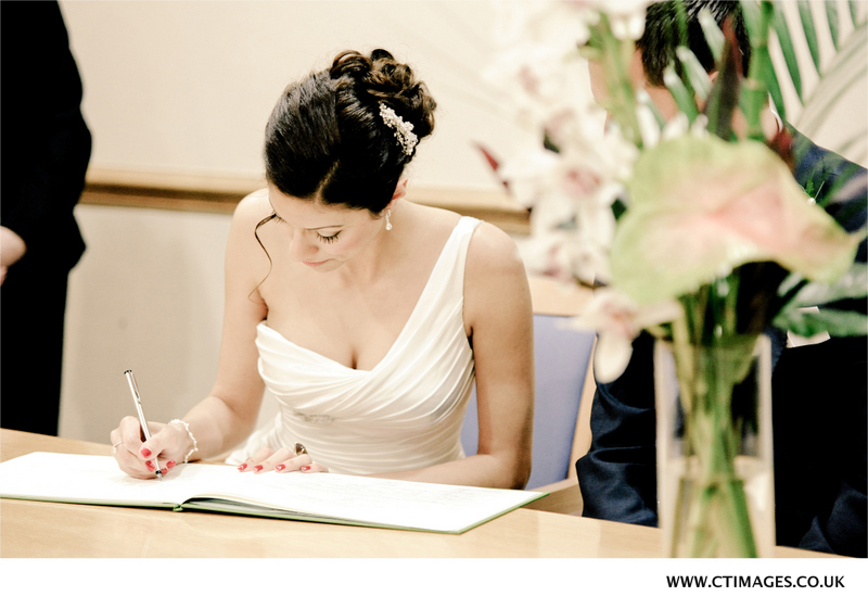 bride-signs-register-at-heron-house-manchester.jpg