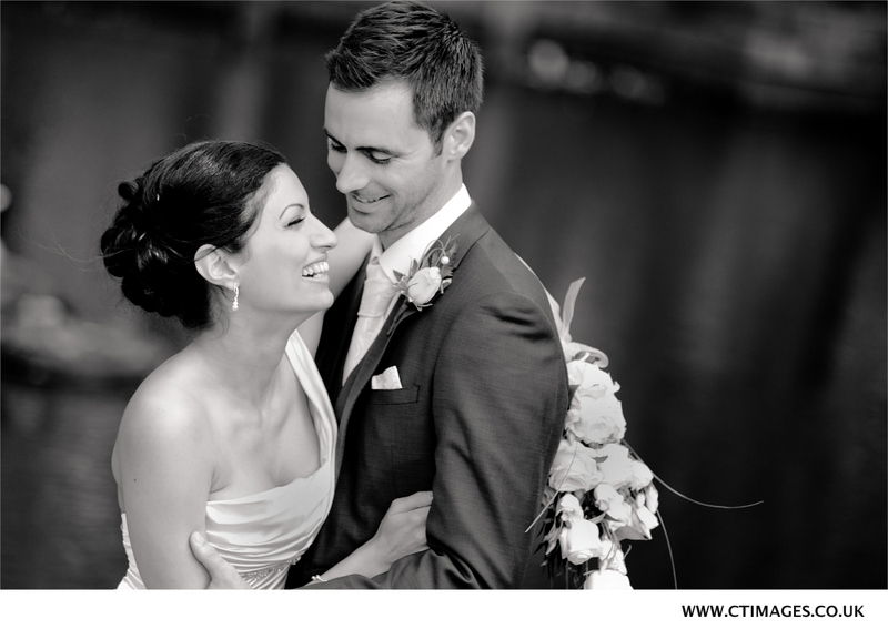 bride-and-groom-laughing-at-fabulous-manchester-wedding.jpg