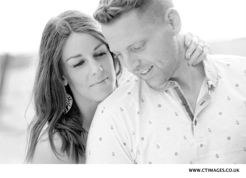 couple-practise-posing-for-photographer-before-cheshire-wedding